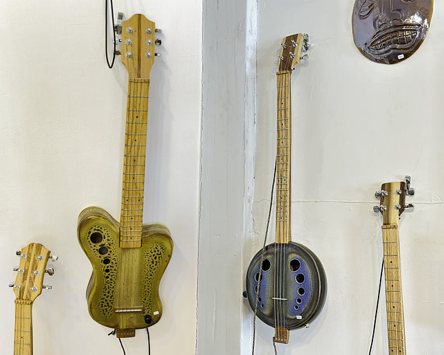 Pottery banjo and guitar at Ken Jenson Pottery St. Augustine Florida