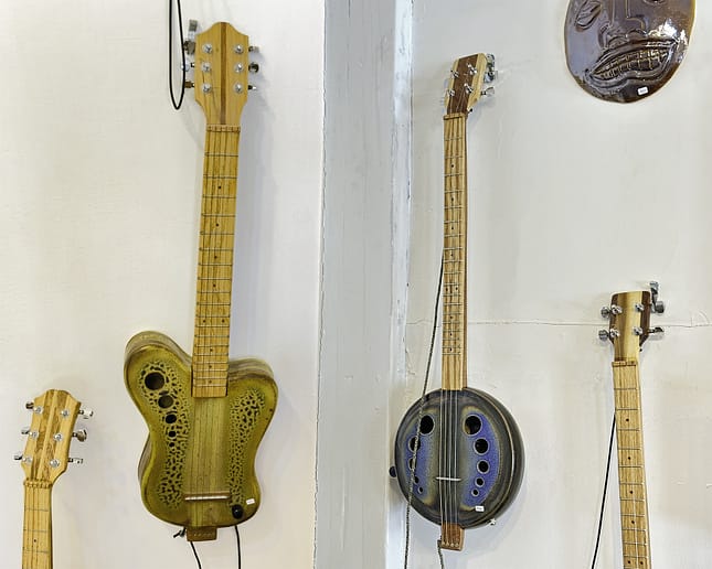 Ken Jenson Pottery Guitar and Banjo Pottery banjo and guitar at Ken Jenson Pottery St. Augustine Florida